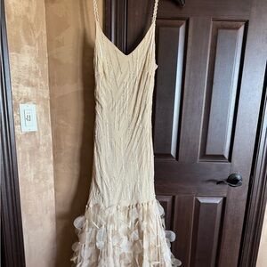 Elegant Cream Beaded & Flutter Mermaid Gown